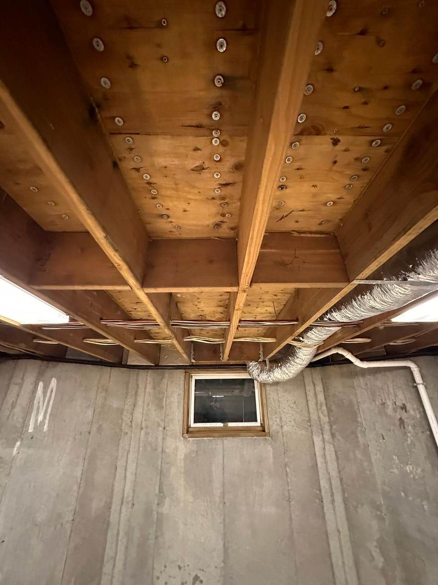 Cleaned and treated floor joists after mold remediation in Brooklyn, NY